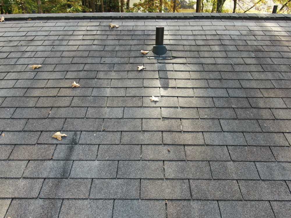 Worn out shingle roof